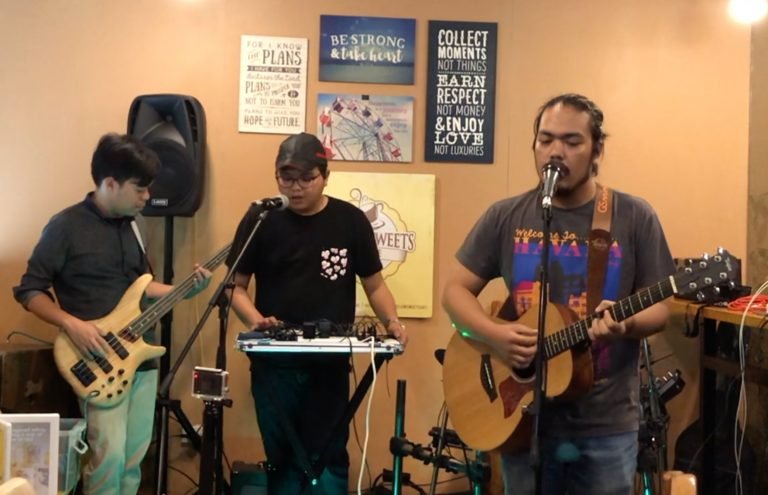 Admiral Peppery performing in Yellow Sweets Cafe